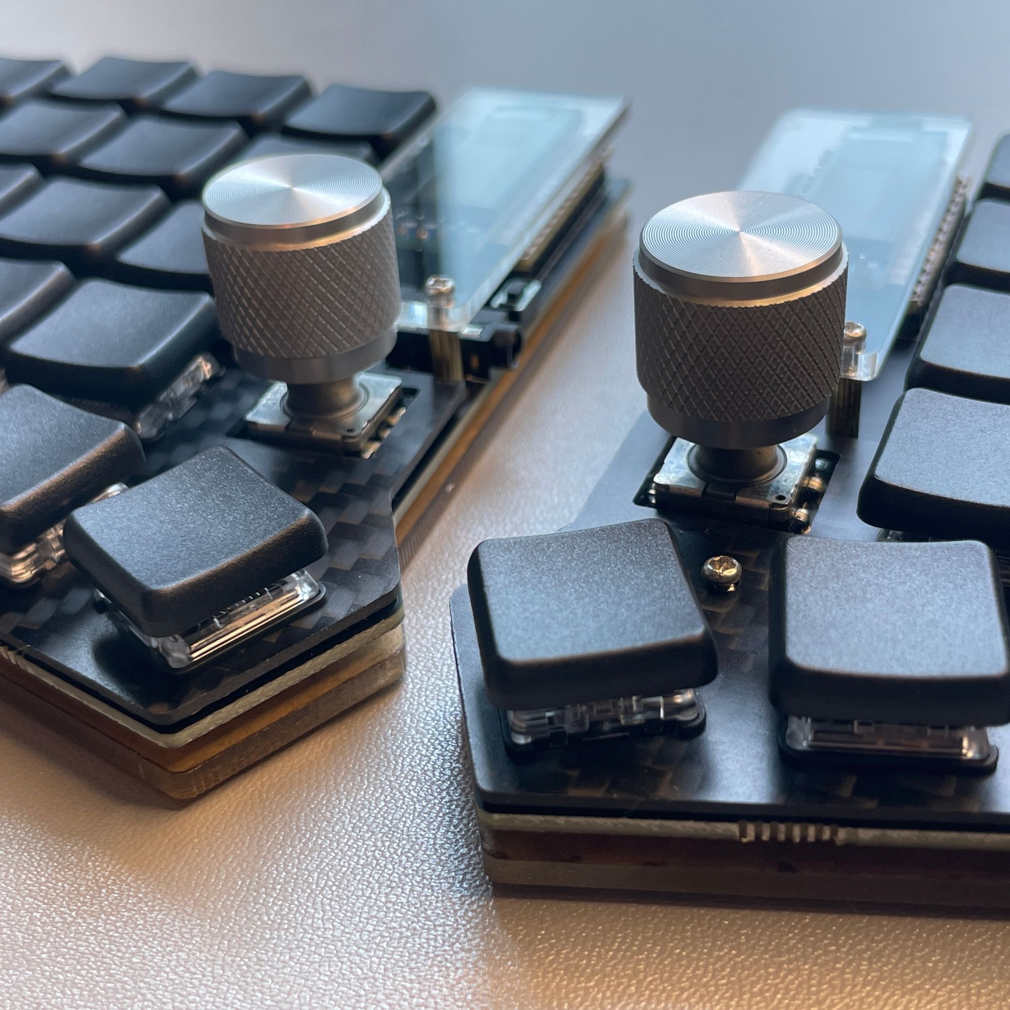 Trying different rotary encoders and knobs on split keyboards