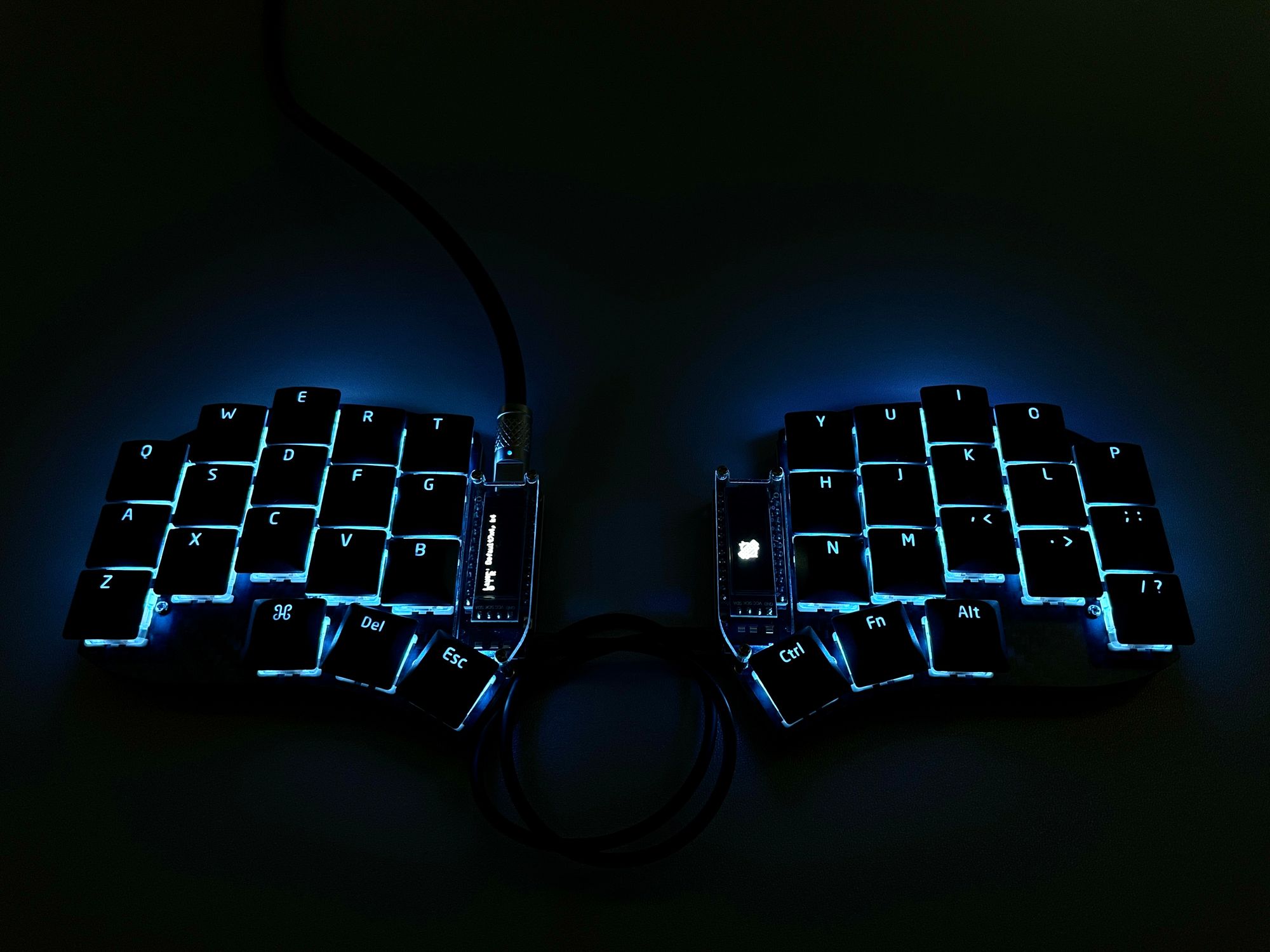 Swoop Keyboard with RGB LEDs glowing in the dark