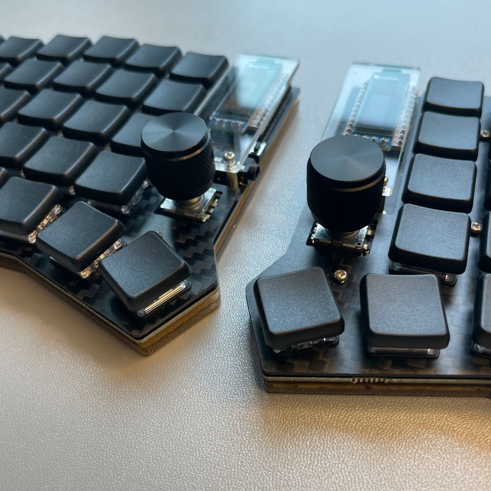 Trying different rotary encoders and knobs on split keyboards