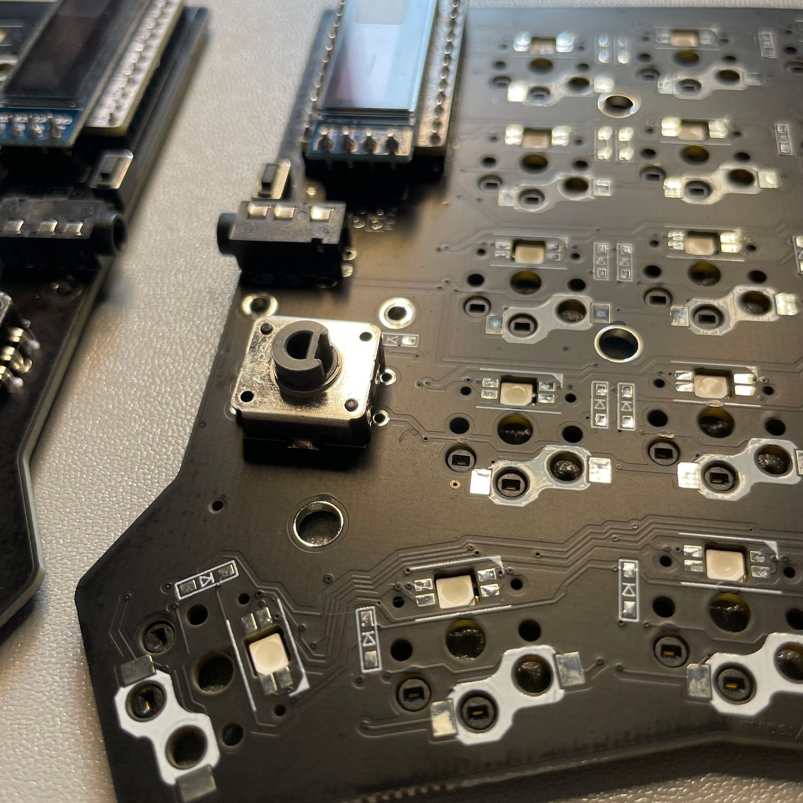 Trying different rotary encoders and knobs on split keyboards