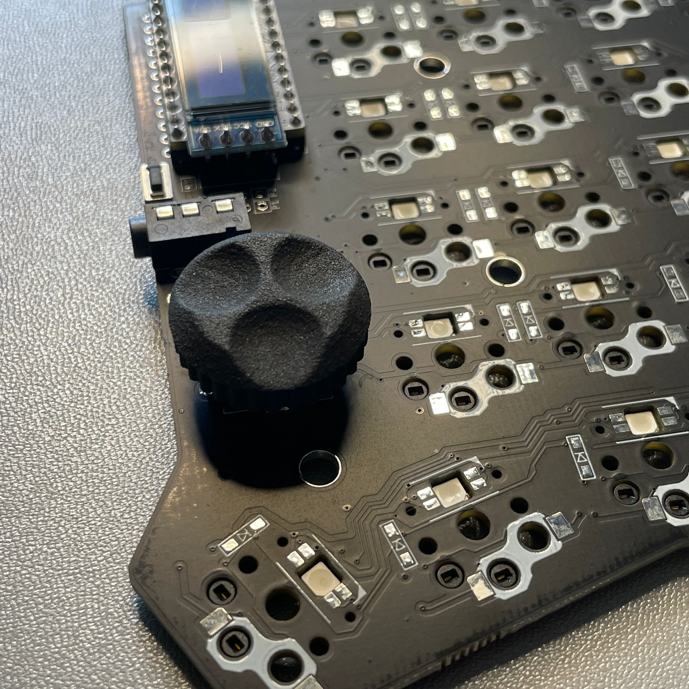 Trying different rotary encoders and knobs on split keyboards